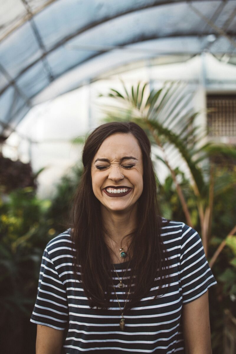 Black hair girl smiling in Chicago's Garfield Park Conservatory