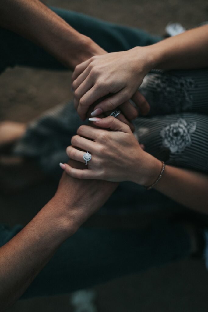 couples hands embracing
