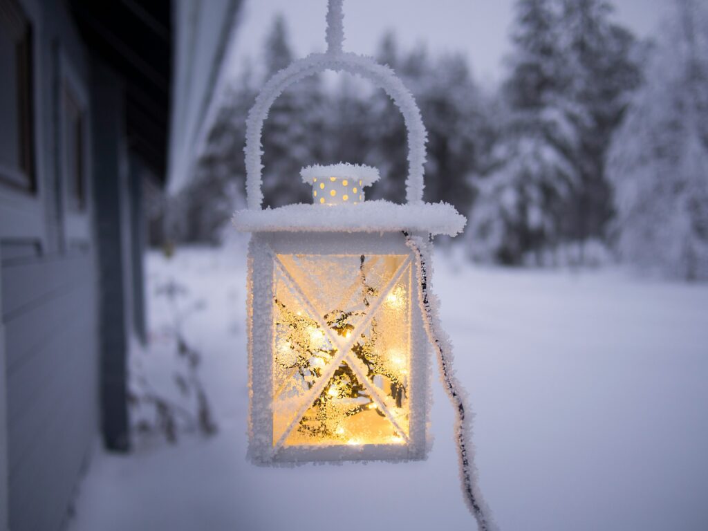 White lantern covered in snow