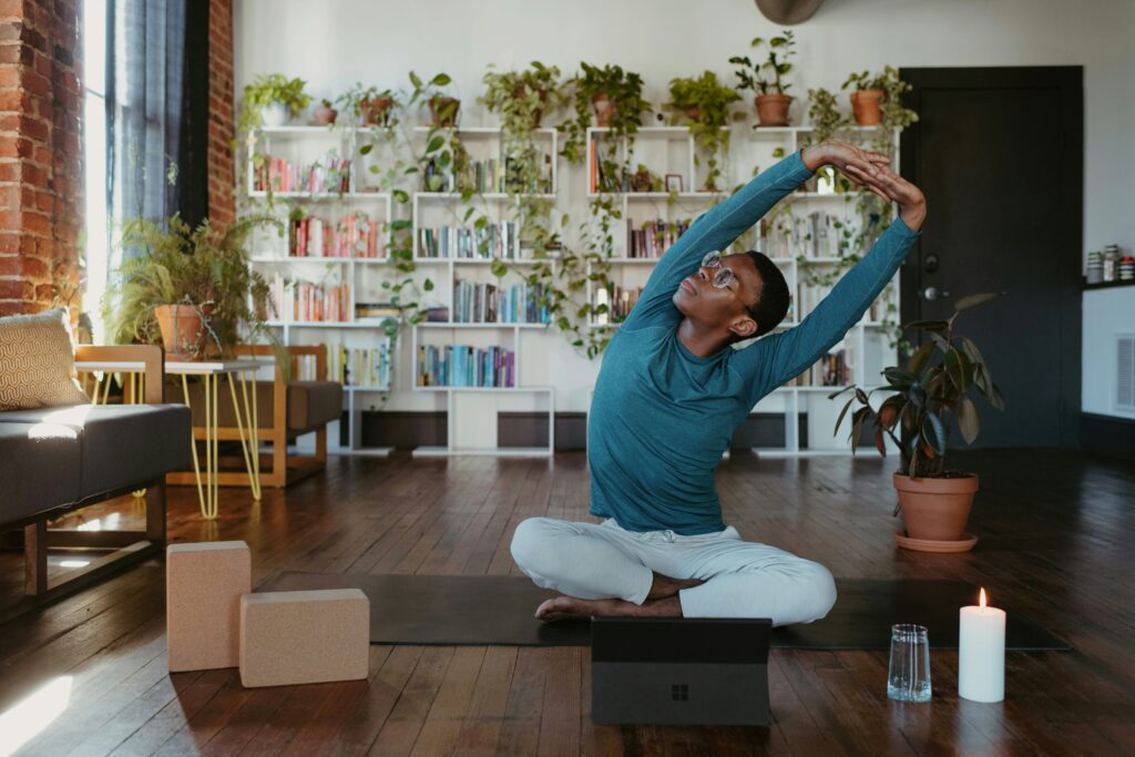 Black woman practicing yoga to deal with silent anxiety attack