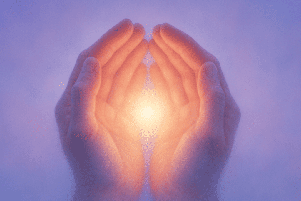 Hand with light representing the hope that comes from EMDR therapy.
