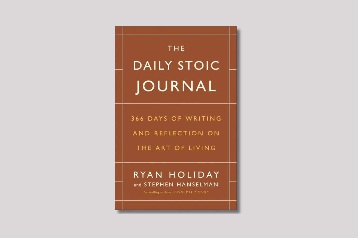 Cover of *The Daily Stoic Journal*: brown hardcover titled “366 Days of Writing and Reflection on the Art of Living” by Ryan Holiday.