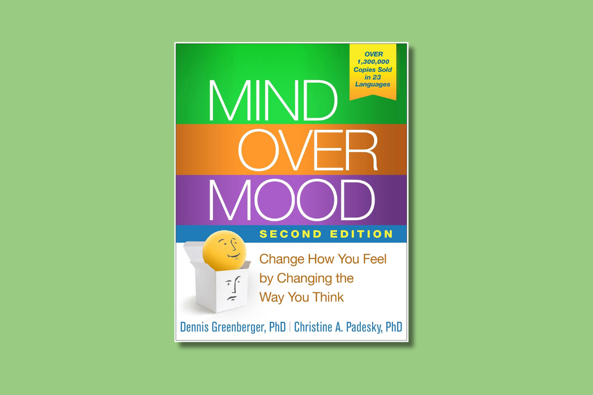 Cover of “Mind Over Mood, Second Edition” by Greenberger and Padesky, featuring the tagline “Change How You Feel by Changing the Way You Think.”