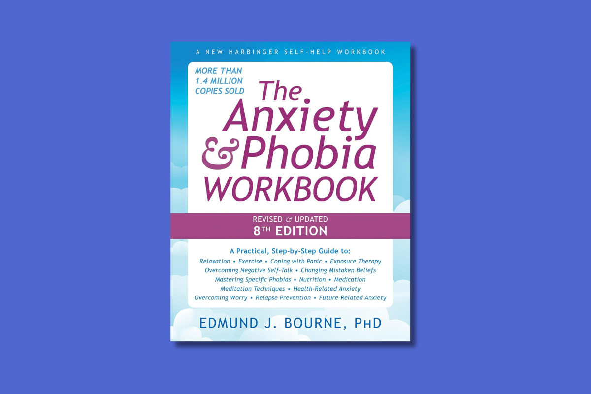 Cover of *The Anxiety & Phobia Workbook* 8th Edition by Edmund J. Bourne, PhD, featuring self-help topics and sky-themed design.