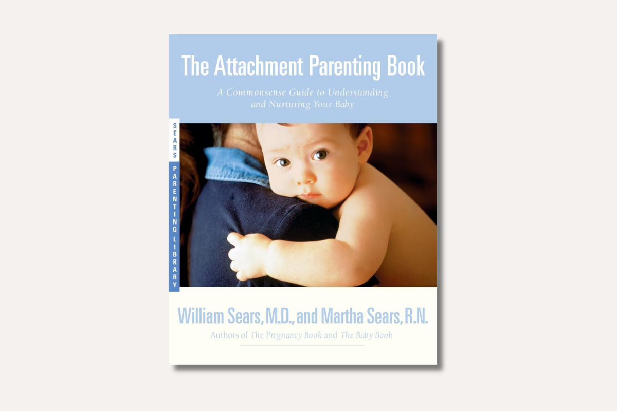 Book cover of ‘The Attachment Parenting Book’ by William Sears and Martha Sears — shows a baby resting on a parent’s shoulder, emphasizing nurturing and secure bonding