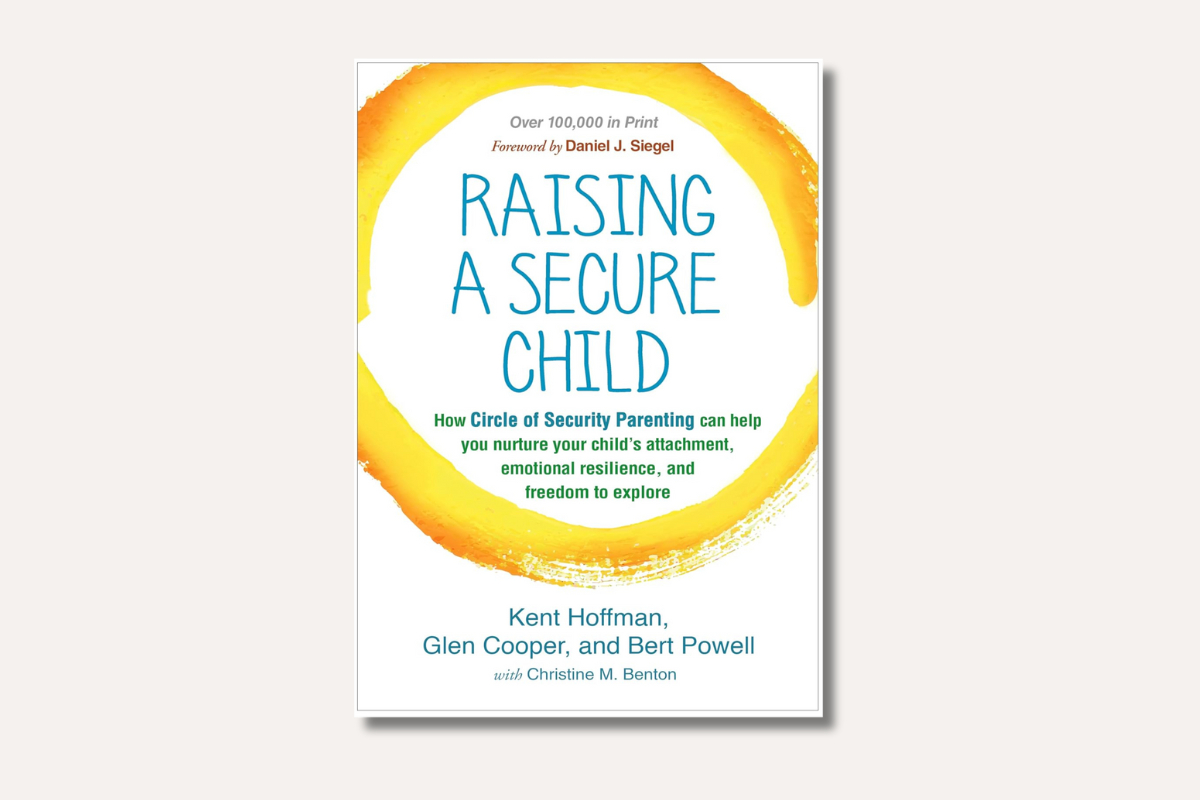 Book cover of ‘Raising a Secure Child’ by Kent Hoffman, Glen Cooper, and Bert Powell — features a yellow circle design, focused on nurturing attachment and emotional resilience in children