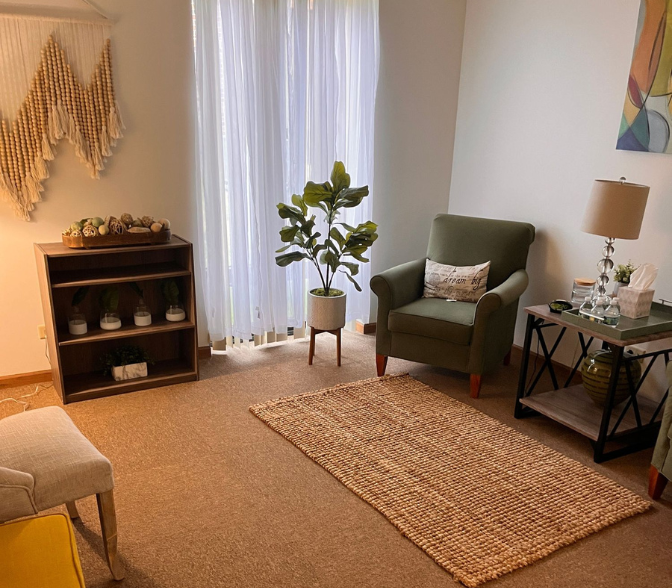 Warmly lit Flossmoor therapy office room